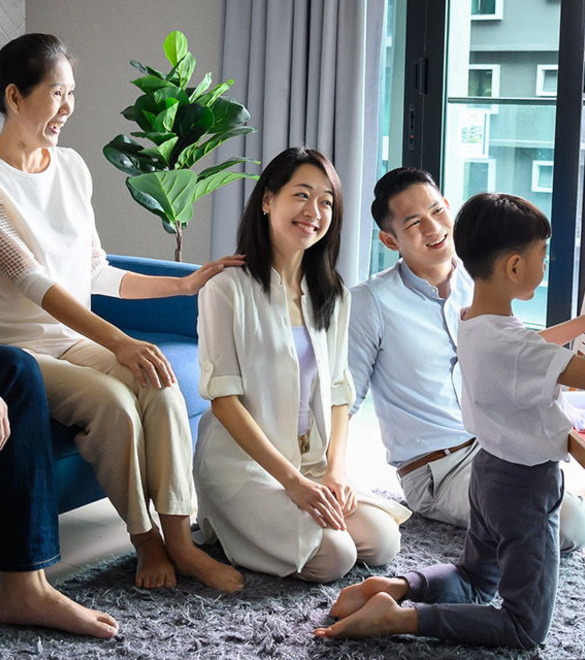 Multi-generation Asian family enjoy leisure activity n the living room.Young Inspiration & Creative Imagination, Family Bonding, Love and Togetherness Concepts.