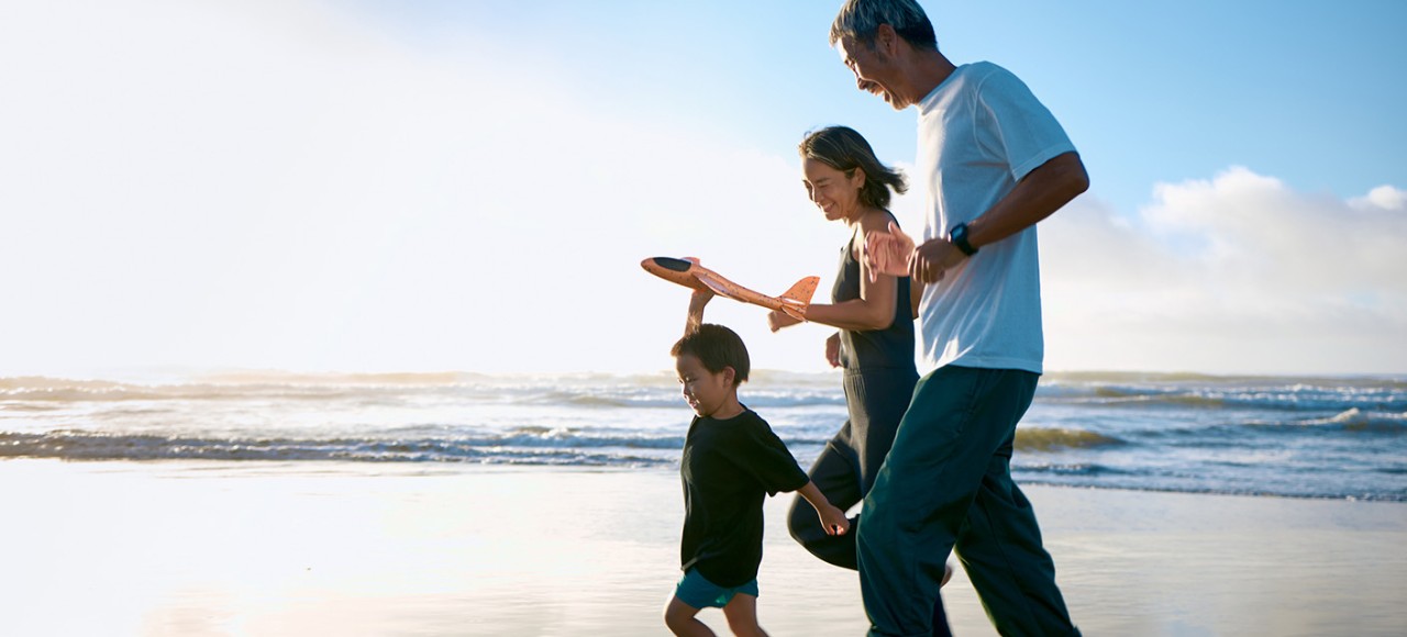 Family run in the morning surf.