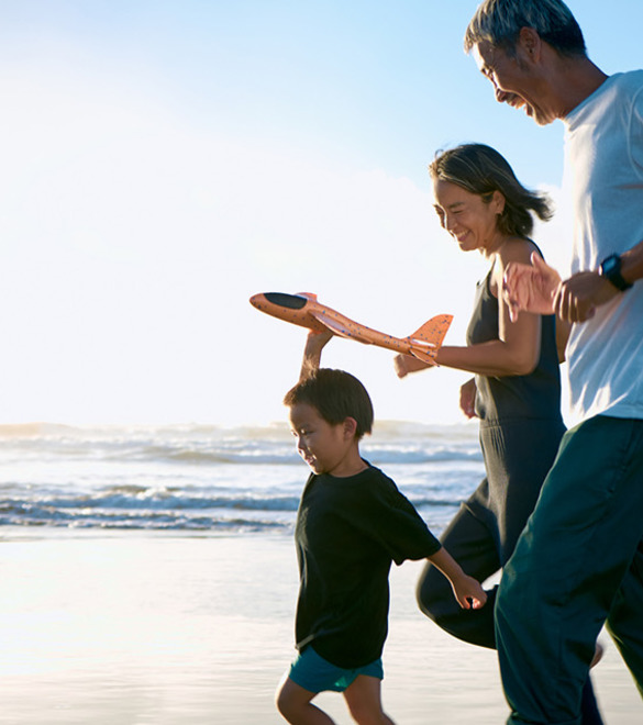 Family run in the morning surf.